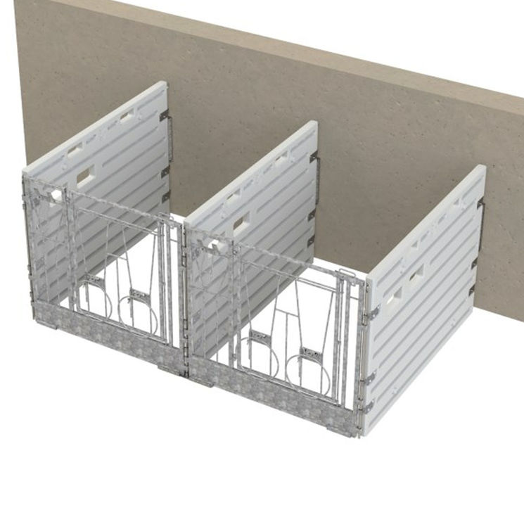 Box à veaux double modulaire placé contre un mur